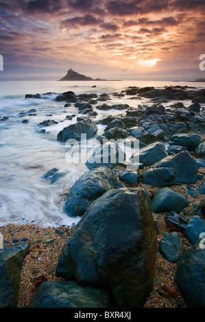 St Michael's Mount captured at sunset  from rocks near Trenow Cove Stock Photo