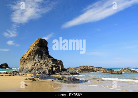 A sea stack on Porthcothan Beach on the North Coast of Cornwall Stock Photo
