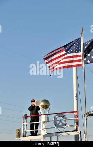 Captain using megaphone to give docking instructions to bridge, Natchez Riverboat, Mississippi River, New Orleans, Louisiana Stock Photo