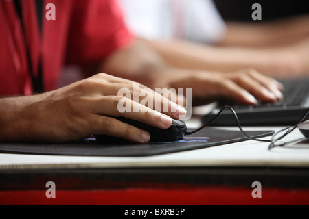 Man using keyboard and mouse. Stock Photo