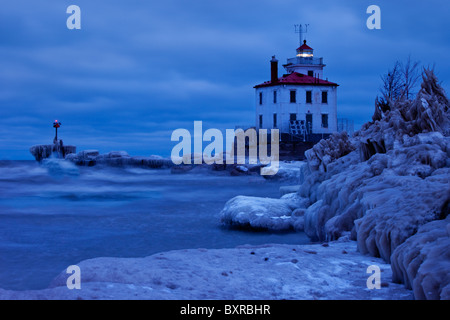 Wintry, Icy night at Fairport Harbor Lighthouse, Fairport Ohio USA Stock Photo