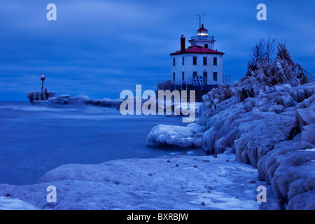 Wintry, Icy night at Fairport Harbor Lighthouse, Fairport Ohio USA Stock Photo