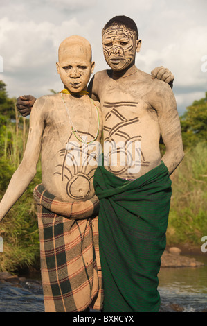 Suri Tribe Man With Body Paintings Posing With A Kalashnikov Omo Valley Ethiopia Stock Photo