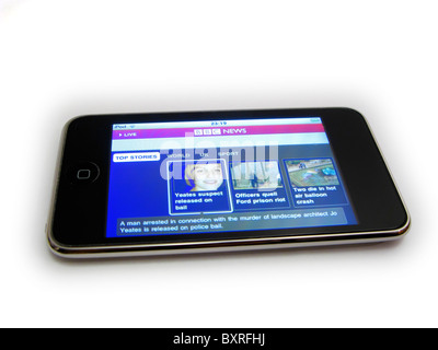 cutout of ipod touch showing bbc news home page Joanna Yeates murder enquiry on white background Stock Photo