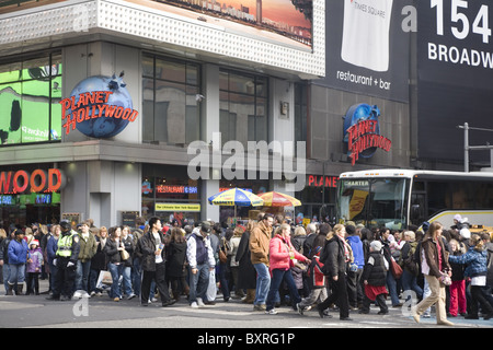 The streets of New York City are extra crowded during the holiday season. Broadway in the Times Square neighborhood. Stock Photo