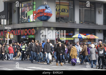 The streets of New York City are extra crowded during the holiday season. Broadway in the Times Square neighborhood. Stock Photo