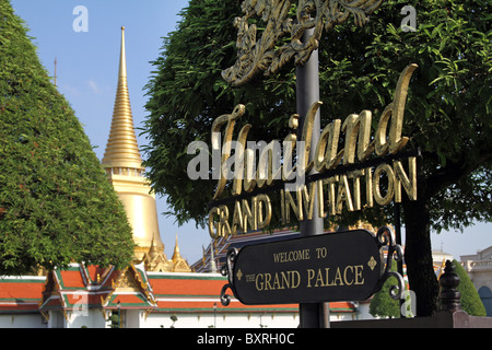Phra Siratana Chedi gold stupa and Grand Palace sign at the Wat Phra Kaeo (Kaew) Temple, Royal Palace complex, Bangkok, Thailand