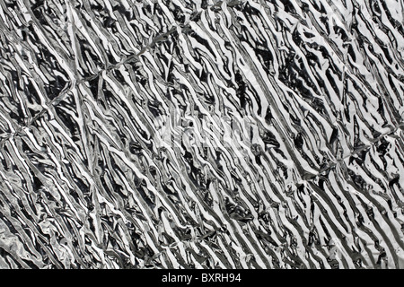shiny metallic reflective surface closeup Stock Photo