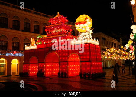 Brightly lit lanterns and a mock up temple light up Senado Square to celebrate Moon Festival, Macau Stock Photo