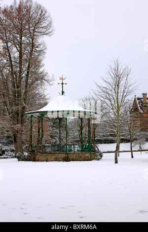 Snow covered Bandstand and gardens in Sherborne' Pageant gardens Dorset Stock Photo