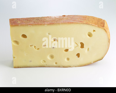 Emmental cheese against white background, close-up Stock Photo