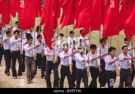 Parade during the celebrations of the 10th National Congress of the Communist Party of Vietnam (2006). Bac Ha, Vietnam. Stock Photo