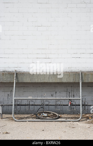 Abandoned Warehouse with Loading Platform and Old Bike Tire Stock Photo