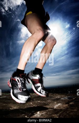 men jumping with hard backlight Stock Photo