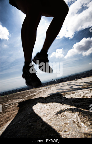 men jumping with hard backlight Stock Photo