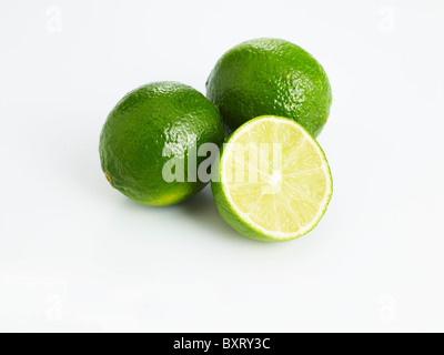 Limes on white background Stock Photo
