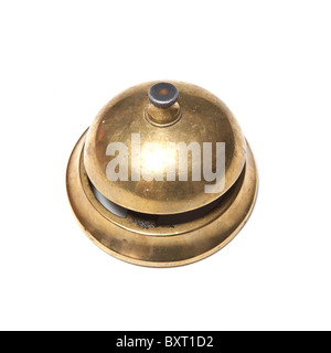 Brass desk or hotel bell isolated on a white studio background. Stock Photo