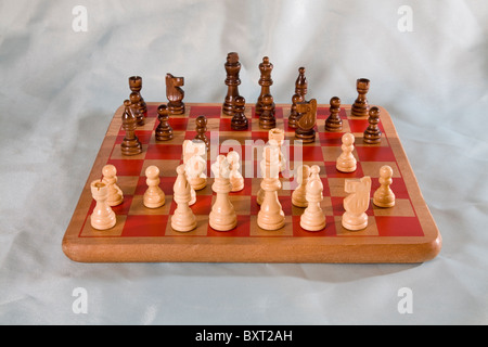 A chess board with chessmen placed in the starting position. Stock Photo