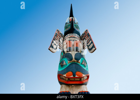 Low angle view of Chief Kyan Totem Pole in Whale Park of Ketchikan, Alaska, USA Stock Photo