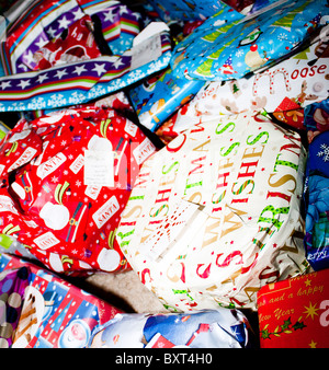 A large selection of Christmas presents; delivered by Santa on Christmas Eve, ready for Christmas day. Stock Photo