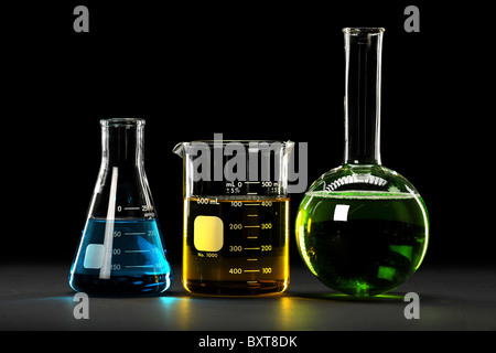 Laboratory glassware with liquids of different colors Stock Photo