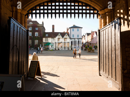 view through the Abbeygate tower looking towards Angel Hill in Bury St Edmunds town centre, UK Stock Photo