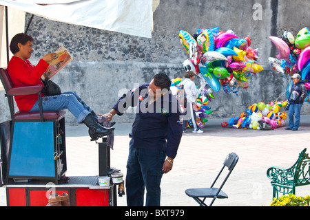 Shoeshine in Hidalgo Plaza in Coyoacan in Mexico City