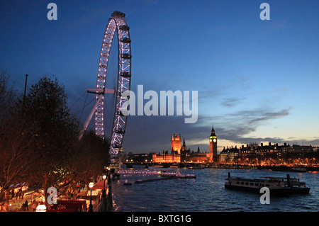 London, Thames, Houses Of Parliament & Big Ben, London Eye And Cologne Christams Market On The South Bank Stock Photo