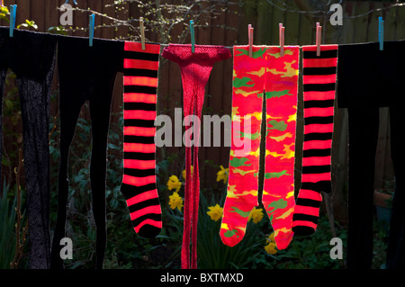 England, Socks On Washing Line Stock Photo