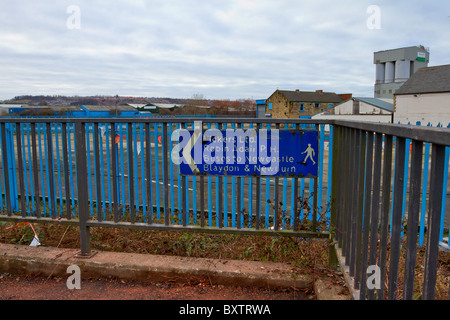 Old information sign at Scotswood bridge pointing to places that are not there now. Stock Photo
