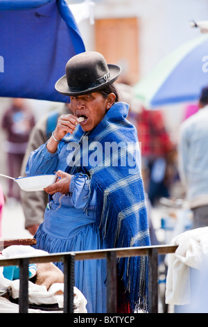 Bolivian Lady in Traditional dress in Market Place, Huari, Bolivia, South America. Stock Photo