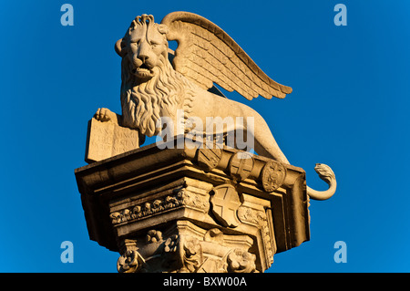 Sculpture of winged lion of St. Mark placed on the top of a column located in Piazza dei Signori, Vicenza, Italy Stock Photo