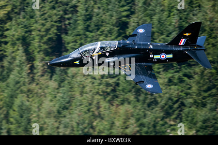 A Hawk T1 trainer aircraft of the Royal Air Force low flying over North Wales. Stock Photo