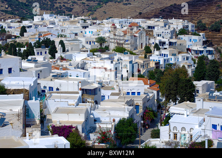 View of the village of Pyrgos, on the Greek Cyclade island of Tinos, with church undergoing restoration in top part of  picture. Stock Photo