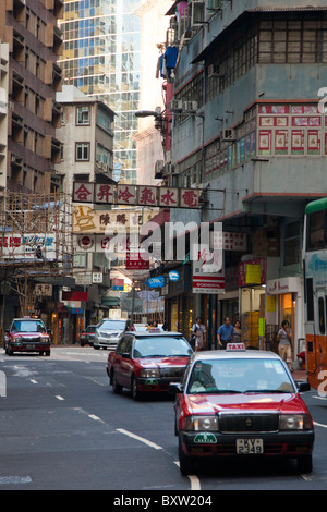 Typical Hong Kong taxi on Nathan Road in Mong Kok, Kowloon, Hong Kong ...