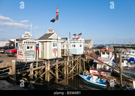 Cruise and fishing charter businesses on the Town Wharf in Plymouth Massachusetts Stock Photo