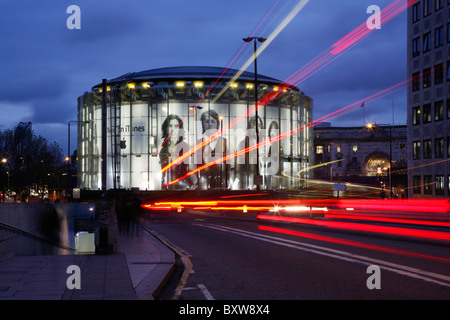 View along Waterloo Bridge to the iTunes Beatles billboard on the IMAX cinema, South Bank, London, UK Stock Photo