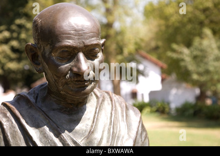 Statue of Mahatma Gandhi in the Sabarmati Ashram (also known as the Gandhi or Satyagraha or Harijan Ashram) in Ahmedabad, India. Stock Photo