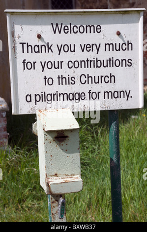 Contributions box outside Iken church, Suffolk, UK. Stock Photo