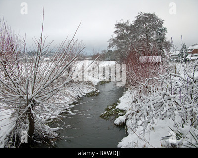 The River Wey in the snow in Godalming Surrey Stock Photo