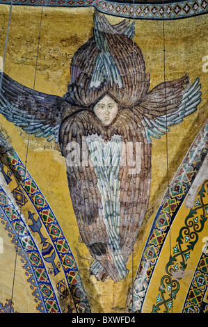 ISTANBUL, Turkey / Türkiye — The Seraphim angel mosaic in Hagia Sophia, Istanbul. The six-winged angel figure, discovered during renovations in 2010, was revealed when a layer of plaster was removed from the ceiling of the south gallery. Originally built as a Christian cathedral, then converted to a Muslim mosque, and now a museum, the Aya Sophya is one of the oldest and grandest buildings in Istanbul. Stock Photo