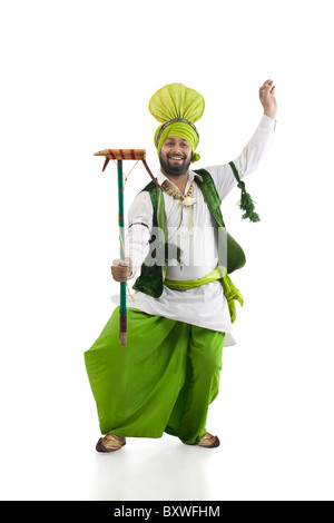 Sikh man holding a Katow Stock Photo