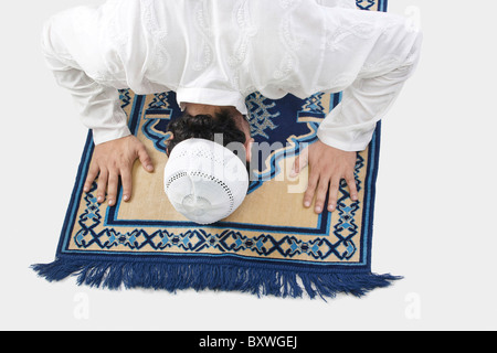 Muslim man praying Stock Photo