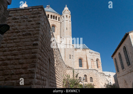 The Dormition Abbey is a massive structure that rises on Mount Zion, just outside the Zion Gate. Stock Photo