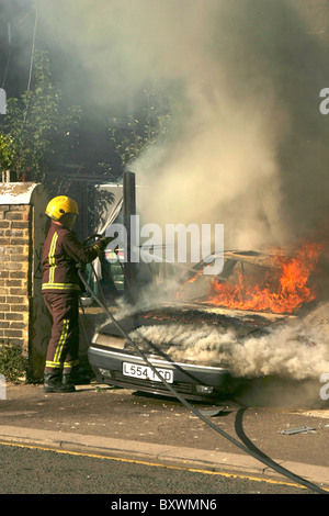 LFB tackle a car fire in East London Stock Photo