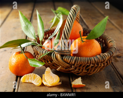 Fresh manderins fruits with leaves. Stock Photo
