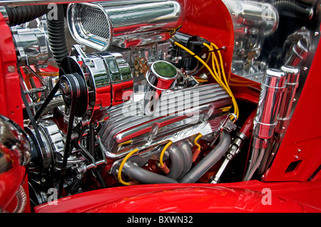 Chromed engine in hot rod car Stock Photo