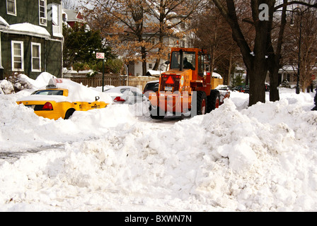 Bulldozer helps in snow cleaning effort in New York Stock Photo