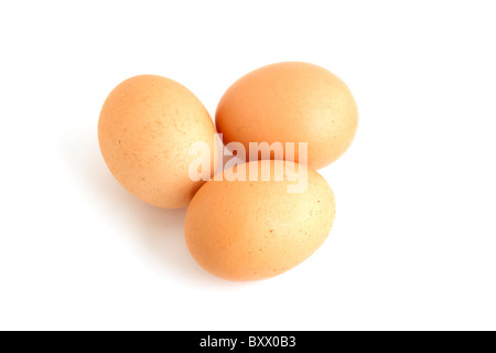 Three eggs on white background Stock Photo