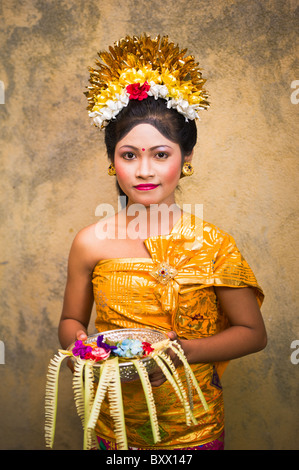 A Portrait of Young Balinese Pendet Dancer with Offering Stock Photo